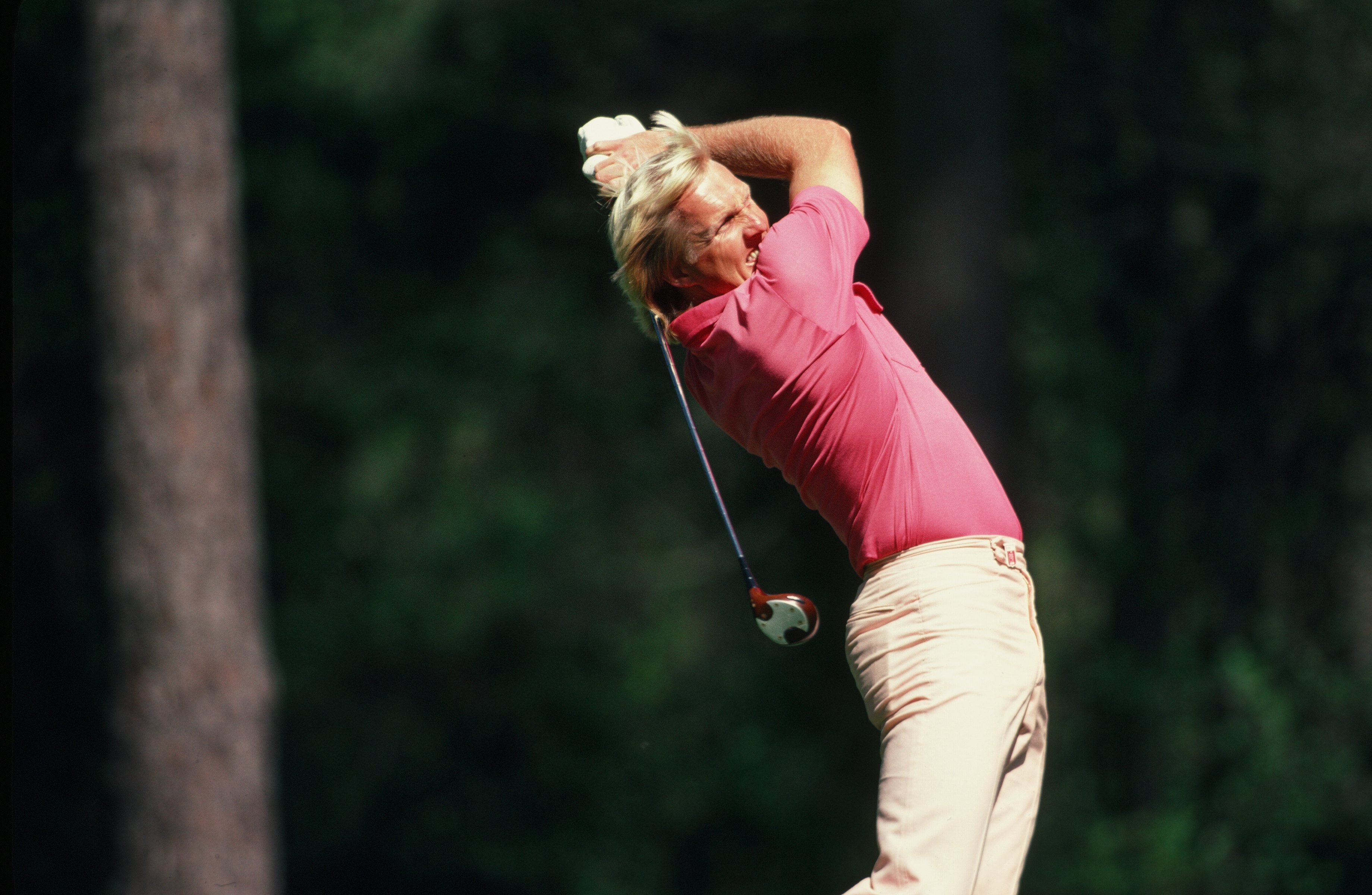 Greg Norman hitting a driver off the tee