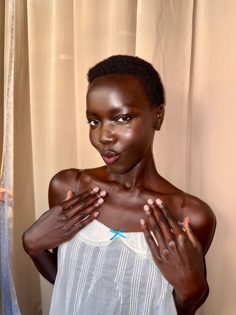Photo of a Sandy Liang model wearing Celisse nail polish