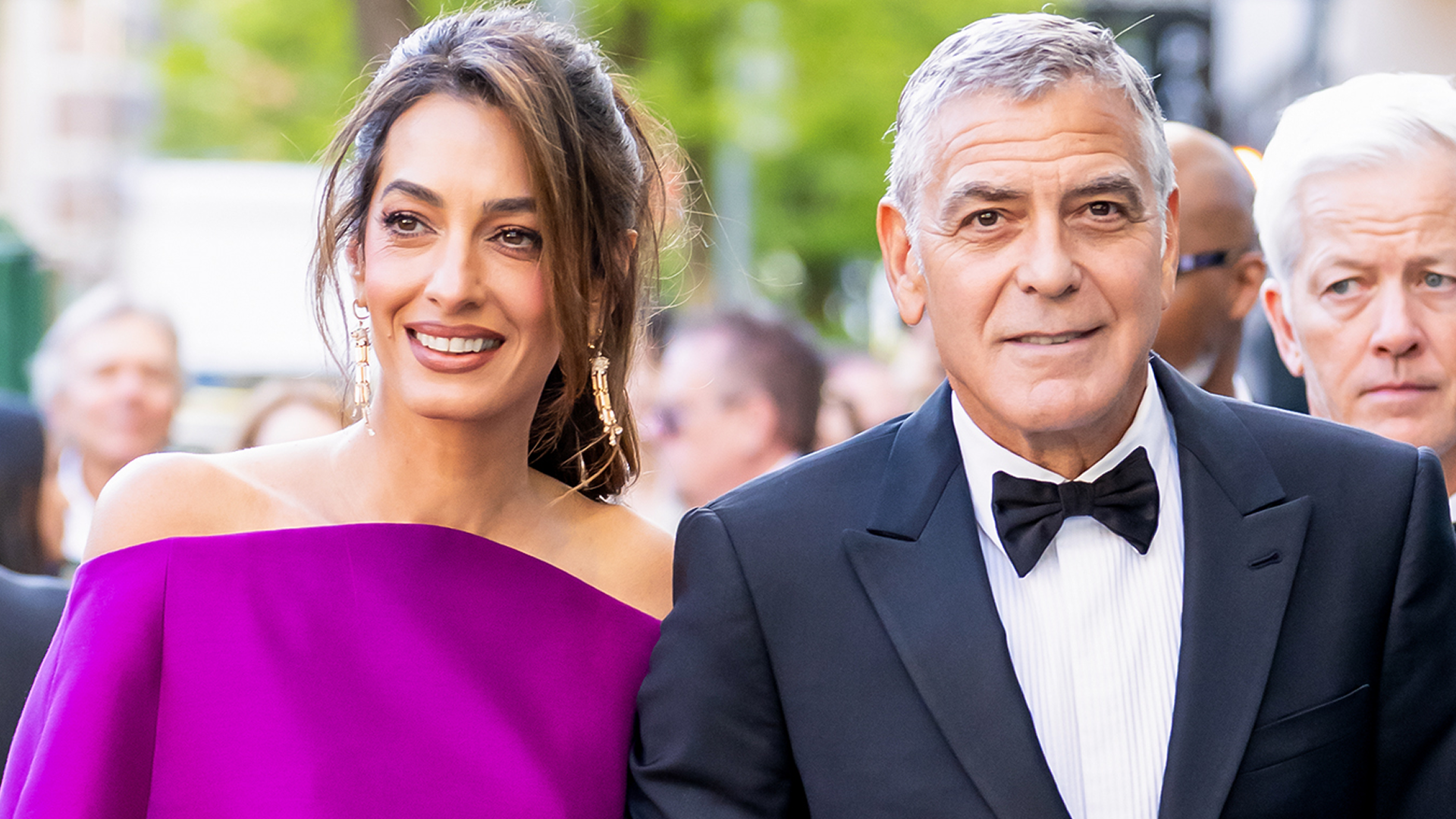Amal Clooney joined George Clooney at the Chaplin Award Gala in a magenta purple mini dress from Balenciaga