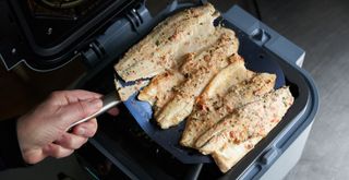 Cooking chicken skewers in an air fryer using an air fryer liner