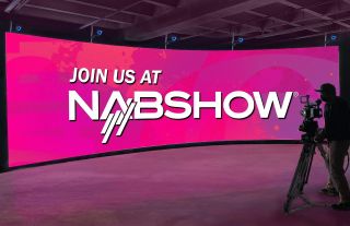 A Planar video wall for virtual production showcasing the NAB Show logo. 