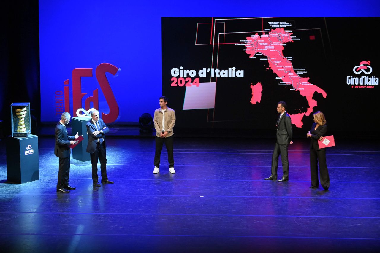 Primož Roglič (left) and Vincenzo Nibali on stage at the conclusion of the 2024 Giro d'Italia route presentation ceremony
