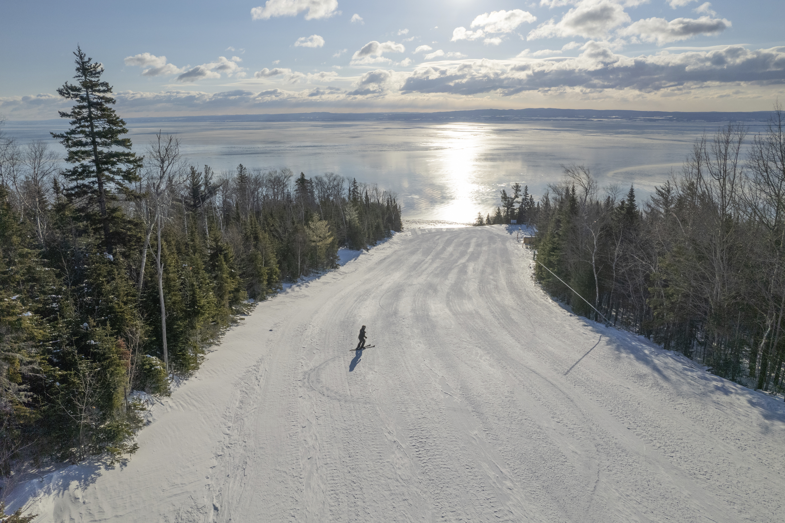 A skier races down a slope at Club Med Quebec Charlevoix