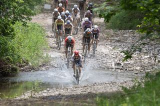 By the 138 mile mark, the men's race had changed dramatically. The group of four had been caught, and two riders were off the front with a group of 20 chasing.