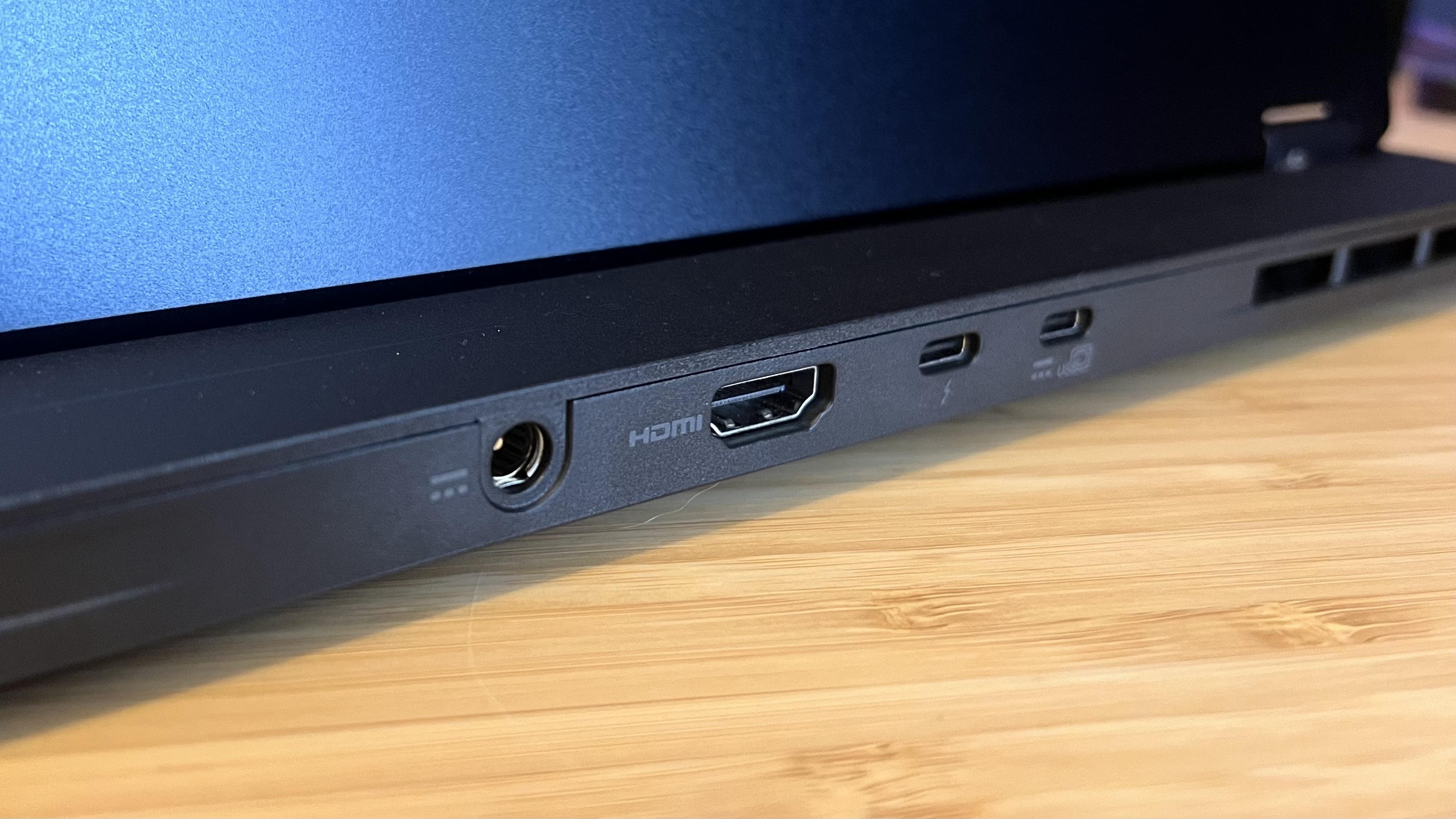 Close up on ports along rear edge of Asus Predator Helios Neo 16S AI