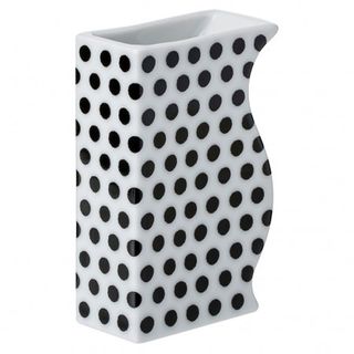 abstract shaped white creamer with black spots from the Conran Shop