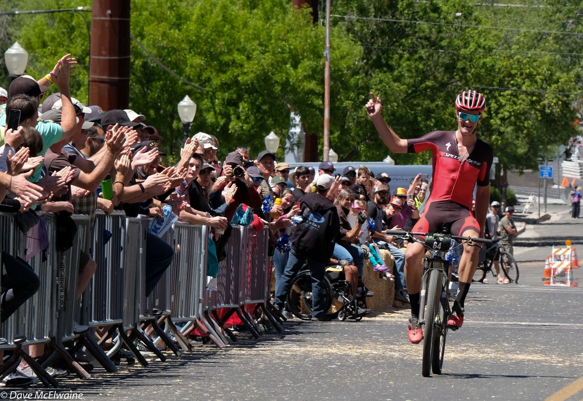 Sam Gaze (Specialized) claims the win and a $5000 check