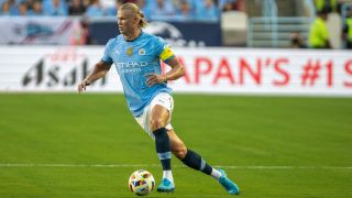 Erling Haaland #9 of Manchester City dribbles up the pitch during a match between Manchester City and Celtic ahead of the Man City vs Man Utd 2024 Community Shield