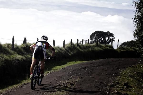 A rider flies downhill