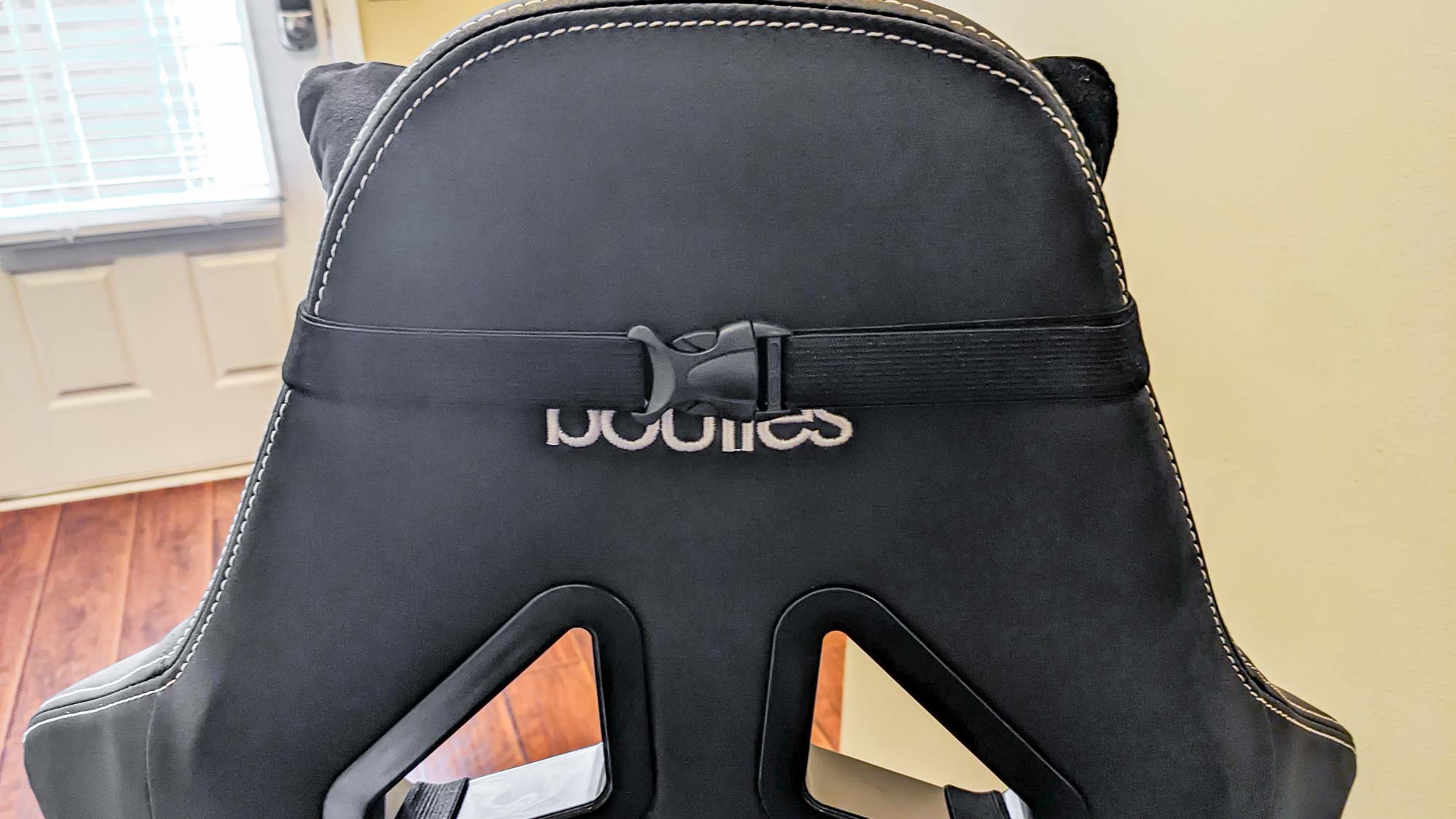 The strap you can use to adjust or remove the Boulies Ninja Pro's headrest pillow