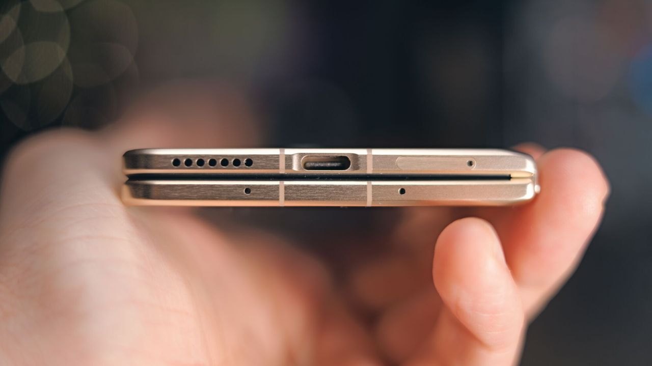 Honor Magic V6 smartphone in gold