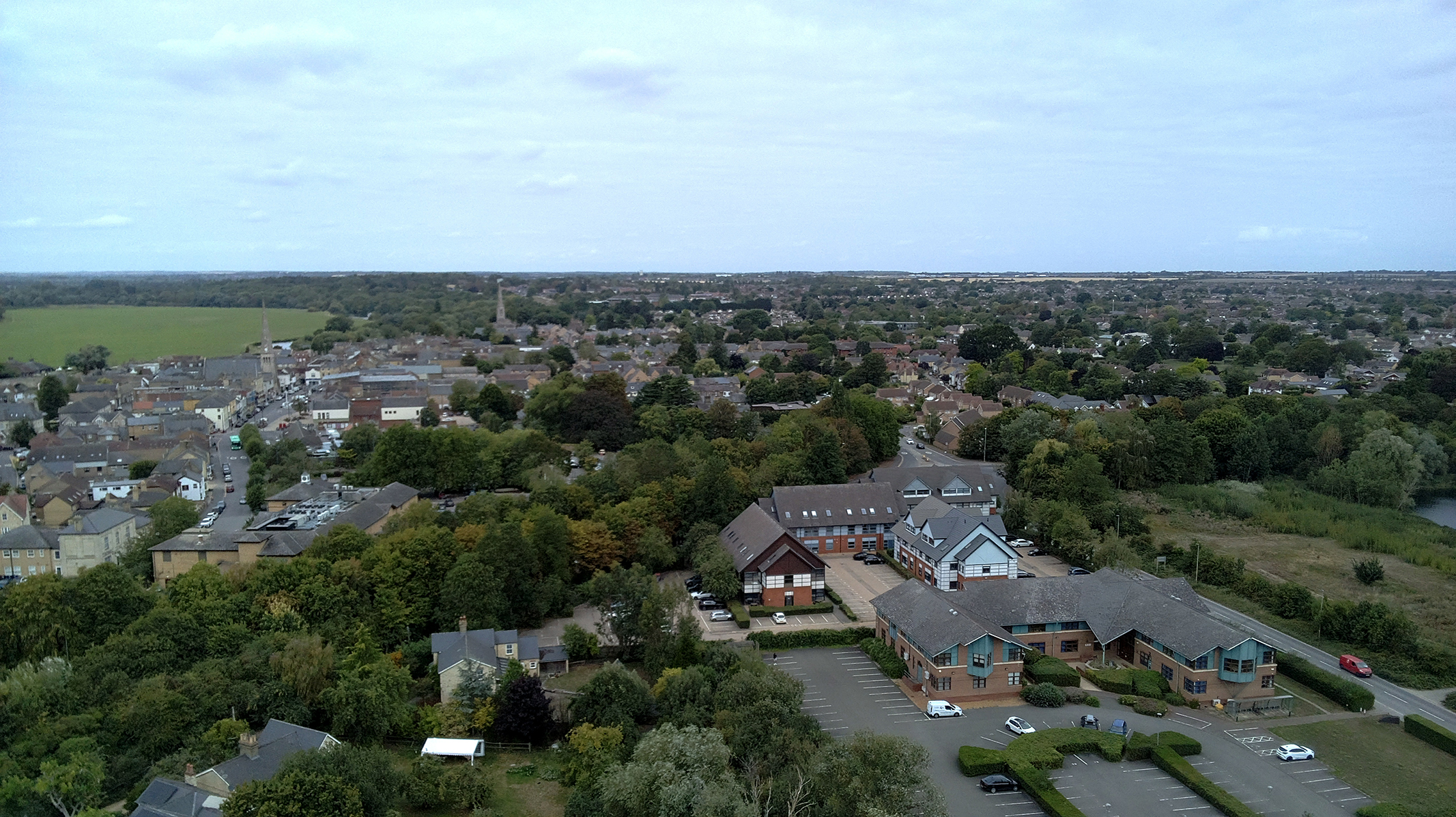 Photo of the edge of a town taken with a Bwine F7GIM drone