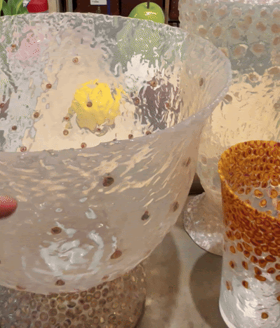 a gif of a wobbling vase made from resin