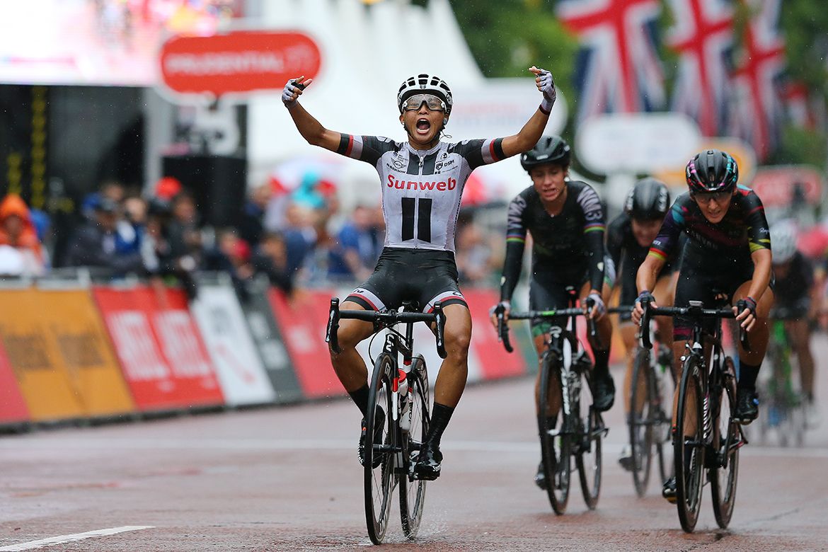 Coryn Rivera posts up in celebration after winning the RideLondon Classique.