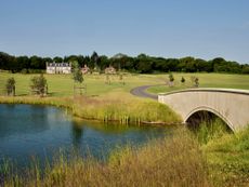 Fig 6: Reptonian vision: the house sits below ancient woodland; a new lake and bridge have transformed a once-degraded landscape. Wield Park, Hampshire. Photograph: ©Paul Highnam for Country Life.