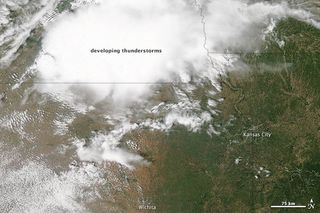 NASA's Aqua satellite acquired this image of a storm system approaching Kansas on May 30, 2012. 