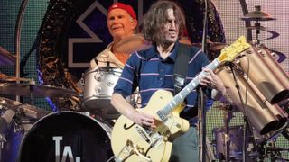 Chad Smith, and John Frusciante of Red Hot Chili Peppers perform at SoFi Stadium on July 31, 2022 in Inglewood, California.