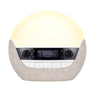 Lumie Bodyclock Luxe 700fm SAD lamp and alarm clock against white background.