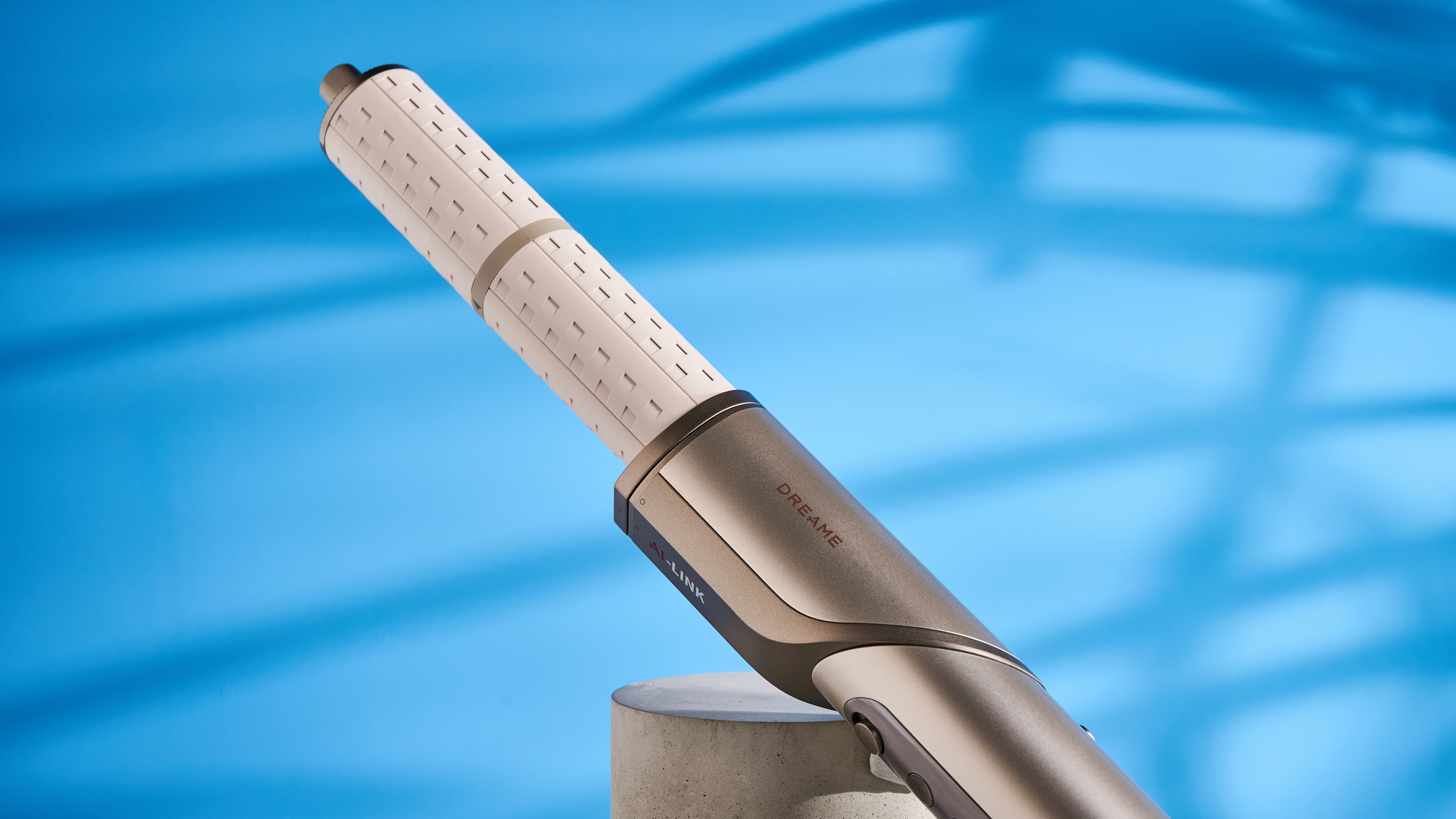 Dreame Dazzle air styler photographed in front of a blue background