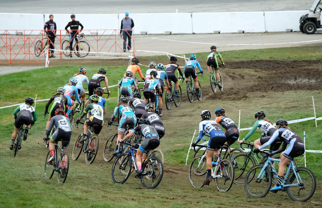 The Elite Women approach the Thompson Speedway crossing