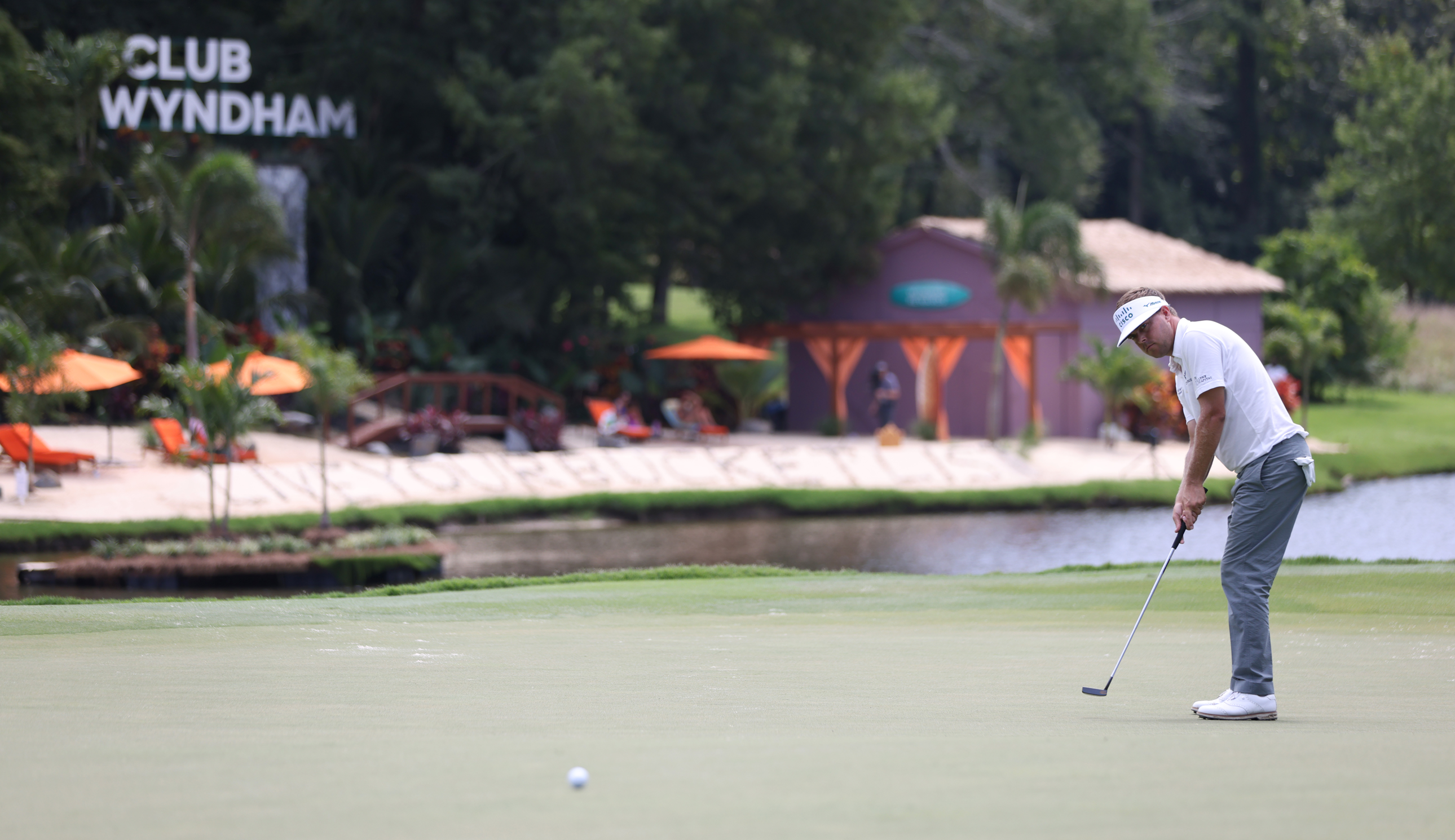 Keith Mitchell hits a putt