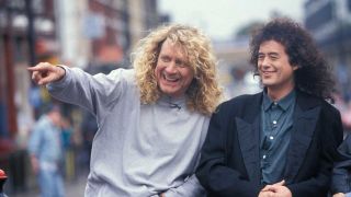 Robert Plant & Jimmy Page pose outside Camden Town tube station in London