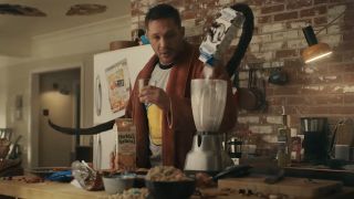 Screenshot of Venom making breakfast for Eddie in Venom: Let There Be Carnage