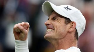 Britain's Andy Murray celebrates beating Britain's Ryan Peniston after their men's singles tennis match on the second day of the 2023 Wimbledon Championships at The All England Tennis Club