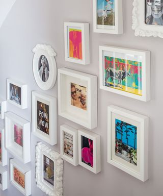 white wall with photo frames
