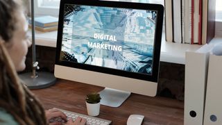 monitor displaying digital marketing slideshow
