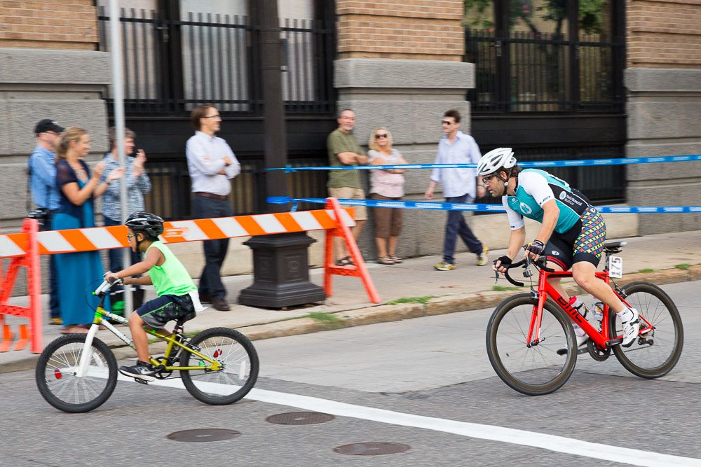 Mike Friedman, coming out of retirement to ride for the North Memorial Hospital composite team, checks out some turns during the kids' race.