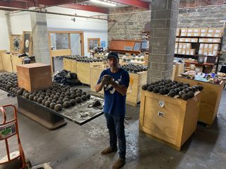Artist Bosco Sodi in his Red Hook studio with the clay spheres that will be used in his Tabula Rasa public art installation