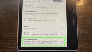 A Kindle Oasis with "Advanced Options" highlighted.
