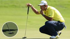 Hideki Matsuyama lines up a putt