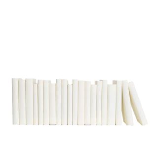 row of decorative books wrapped in white paper