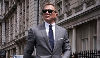 No Time To Die Daniel Craig sharply dressed on a London street