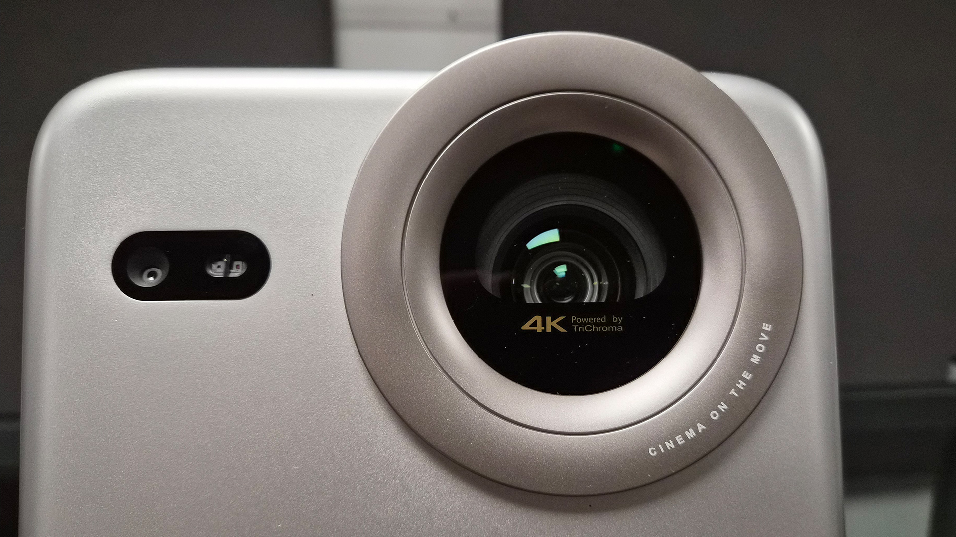 Hisense M2 Pro lifestyle projector close up on lens