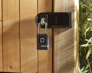 Padlock used on a shed to secure it in the garden