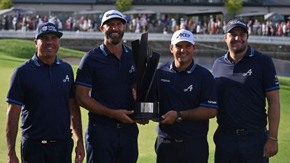 The 4aces LIV Golf team with a trophy