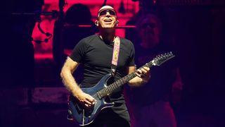 American rock guitarist, composer and songwriter Joe Satriani, member of the American rock band Sammy Hagar and the Circle performs during &#039;The Best of All World Tours&#039; at Dos Equis Pavilion