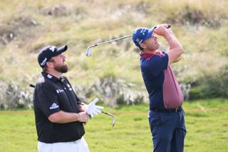 Shane Lowry and Padraig Harrington practicing together