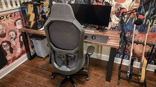 The Fractal Refine gaming chair seen from behind showing off its backrest and adjustable lumbar support mechanism