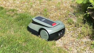 ECOVACS GOAT GX-600 sits on grass