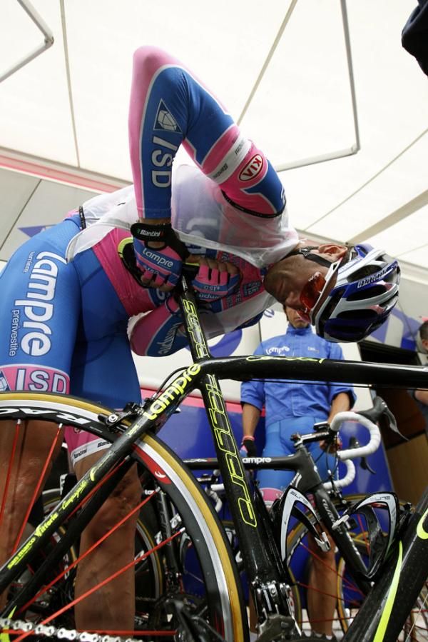 Petacchi checks his bike