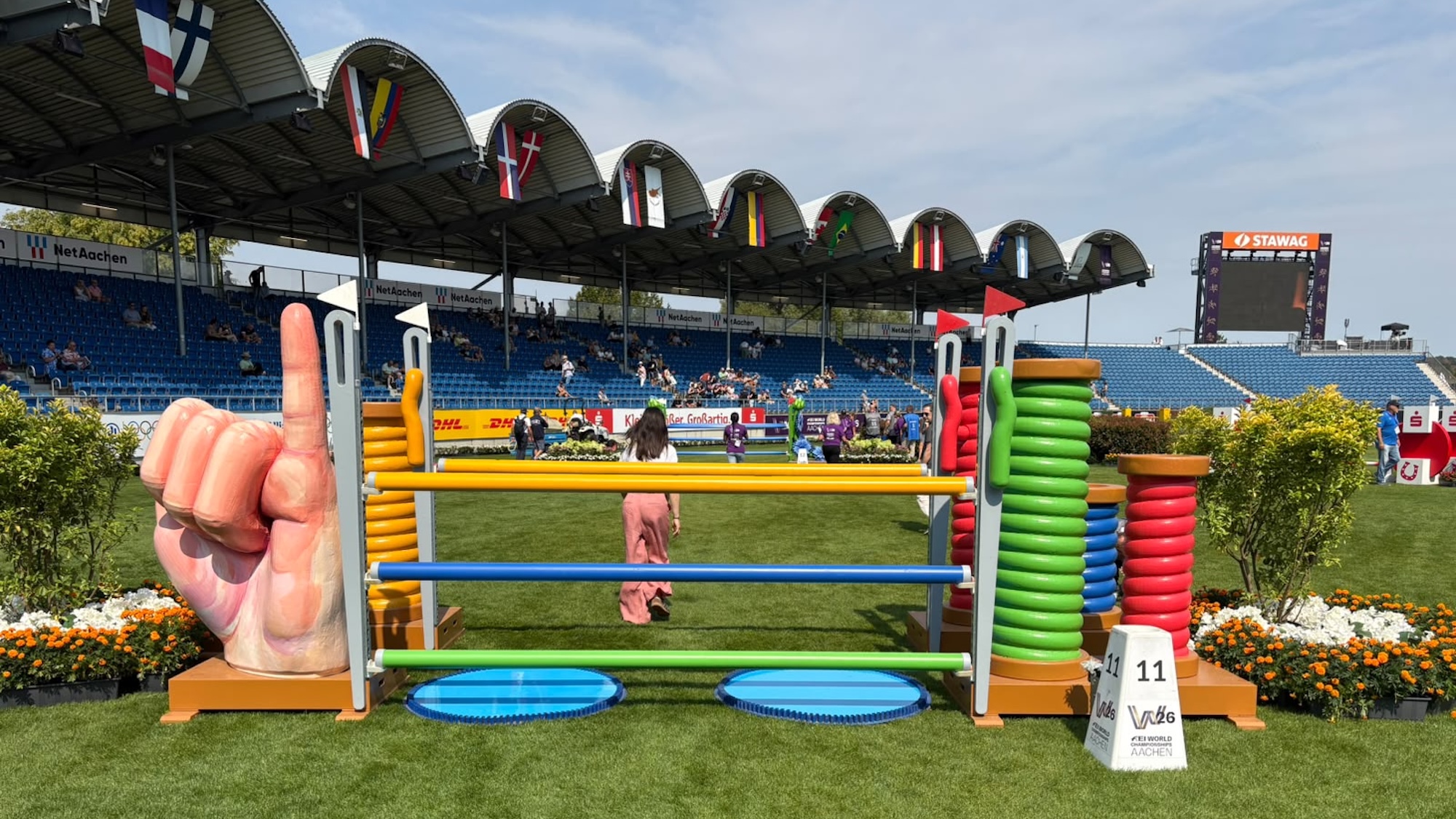 colourful showjump in main arena at Aachen eventing world championships