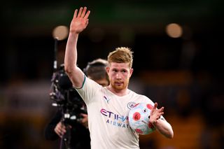 Kevin De Bruyne with the match ball after scoring four for Manchester City in a 5-1 win at Wolves in May 2022.