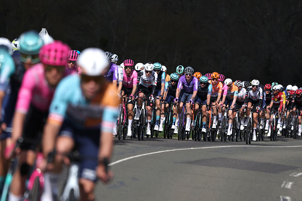 The pack rides during the 2nd stage of the Paris-Nice cycling race, 187 km between &amp;Eacute;p&amp;ocirc;ne and Montargis, on March 9, 2026. (Photo by Anne-Christine POUJOULAT / AFP)