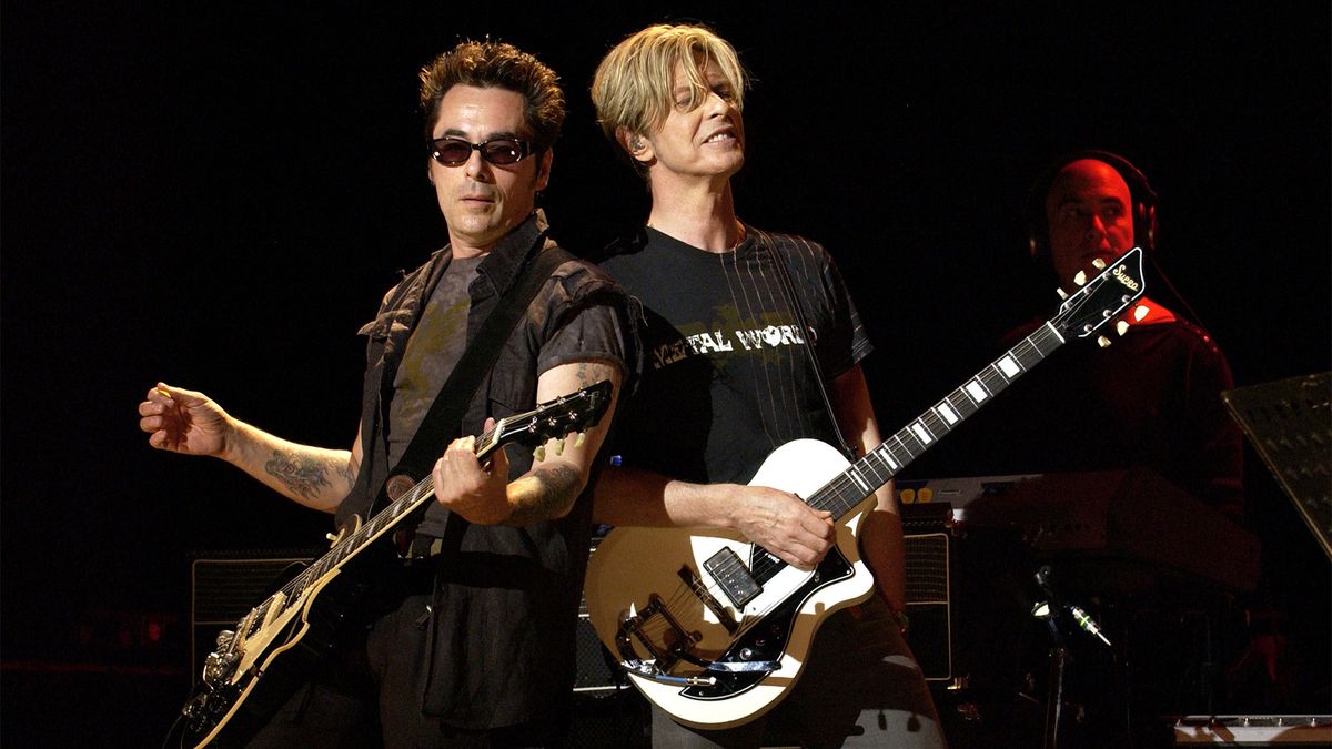 David Bowie's Final Curtain: The Legendary Show That Closed His Touring Chapter 5 Earl Slick and David Bowie during A Reality Tour warm-up show