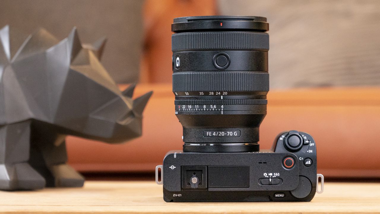 The Sony ZV-E1 camera sitting on a wooden table