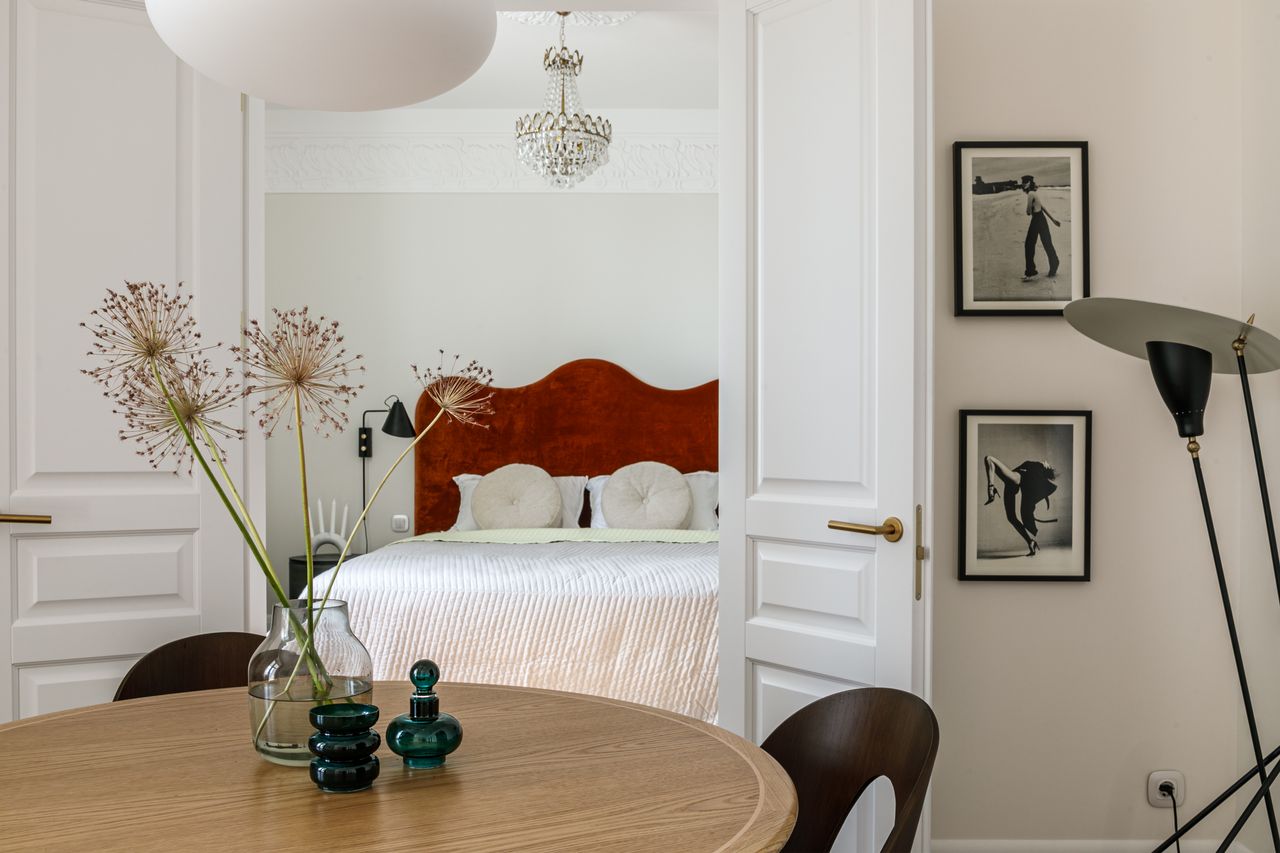 View into the bedroom through the dining room 